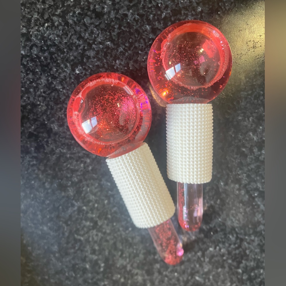 NWOT face roller ice globes